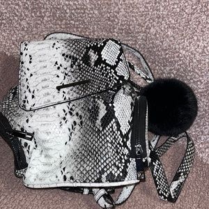 Cute Aldo snake skin small bookbag